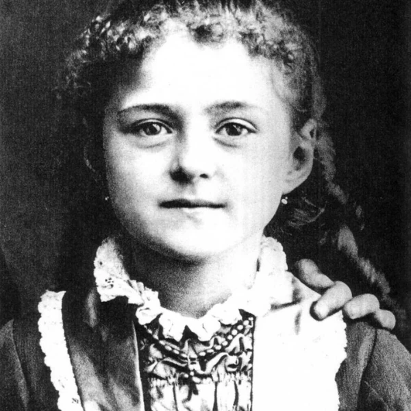 Young girl with curly hair and a lace collar, gazing calmly at the camera. A hand rests supportively on her shoulder. Floral line art decorates the left.
